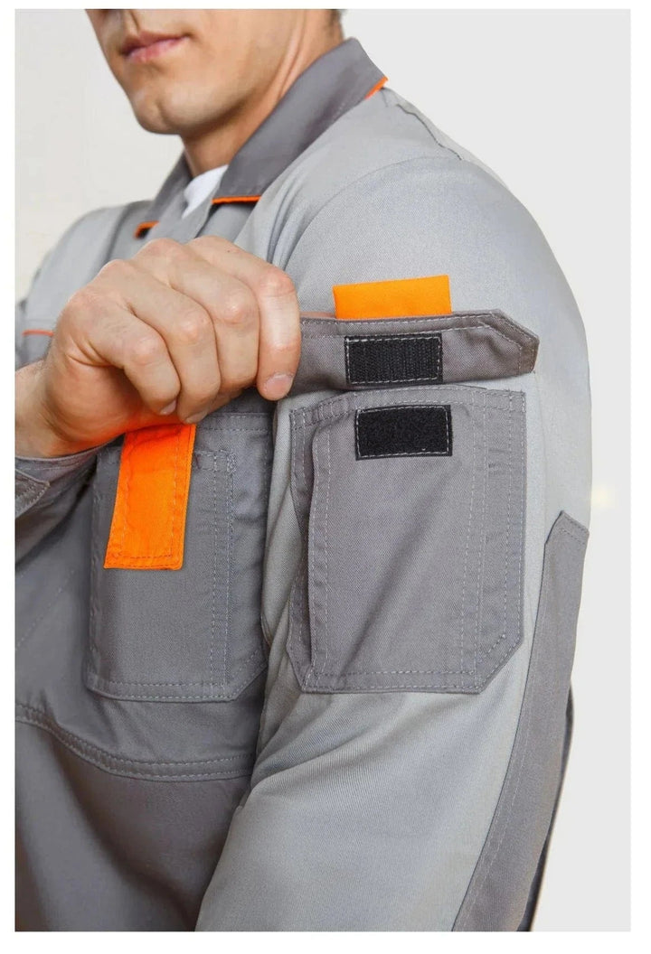 An upper-sleeve Velcro pocket keeps small essentials secure and close at hand.