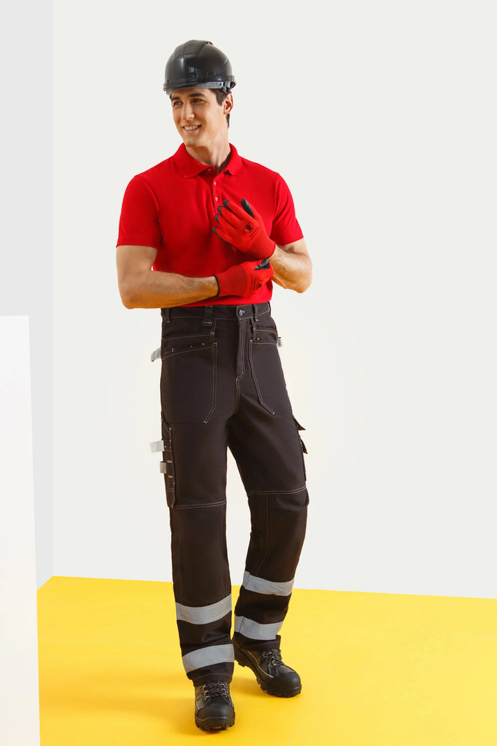 Dense woven fabric and sturdy pocket construction are built for repeated jobsite wear.