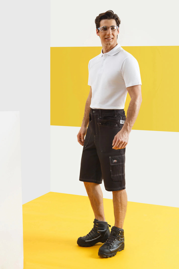 A knee-length cut and straight fit provide practical coverage without restricting movement.