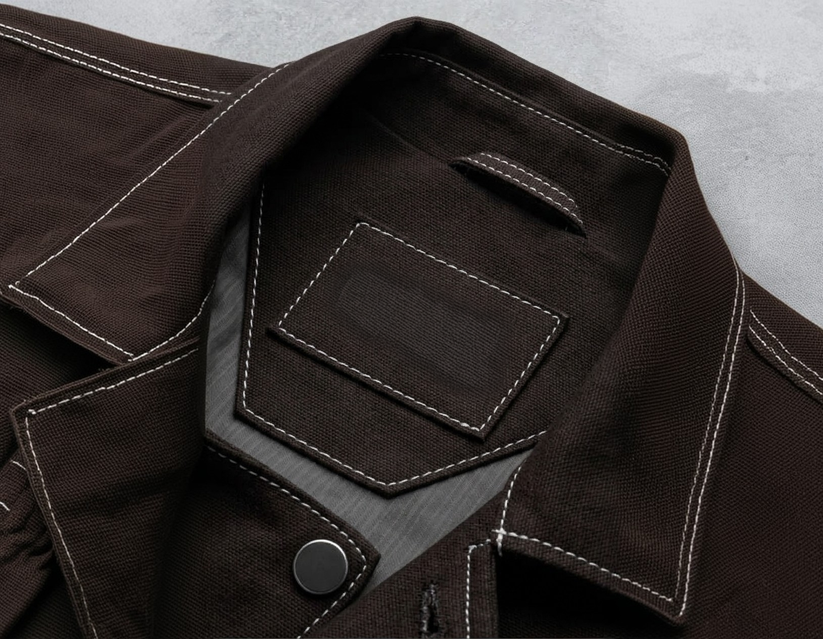 Detalle del tejido resistente de la ropa de trabajo